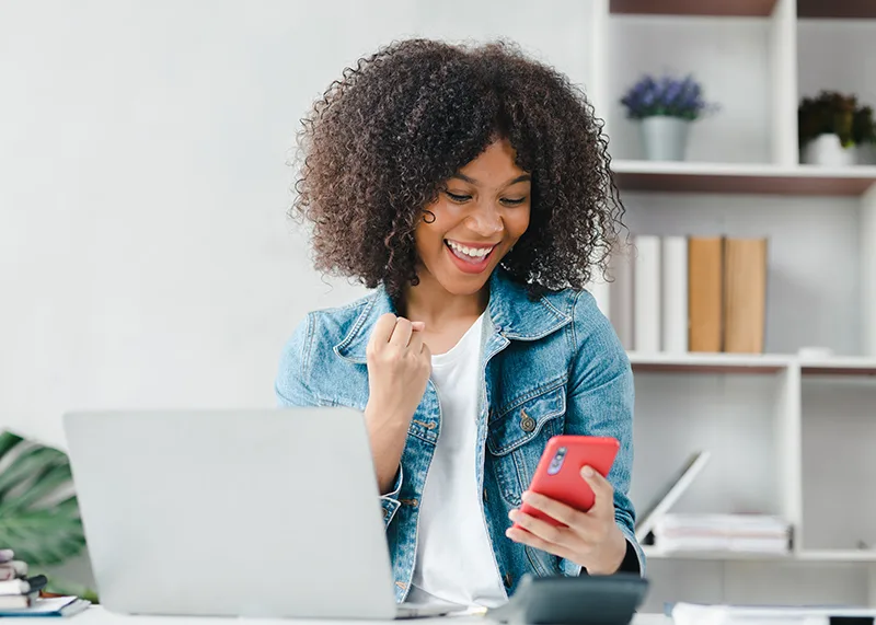 Musimack Marketing Woman Looking at Phone