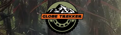 Globe Trekker logo with mountain, tire, and orange banner over a dark forest background.
