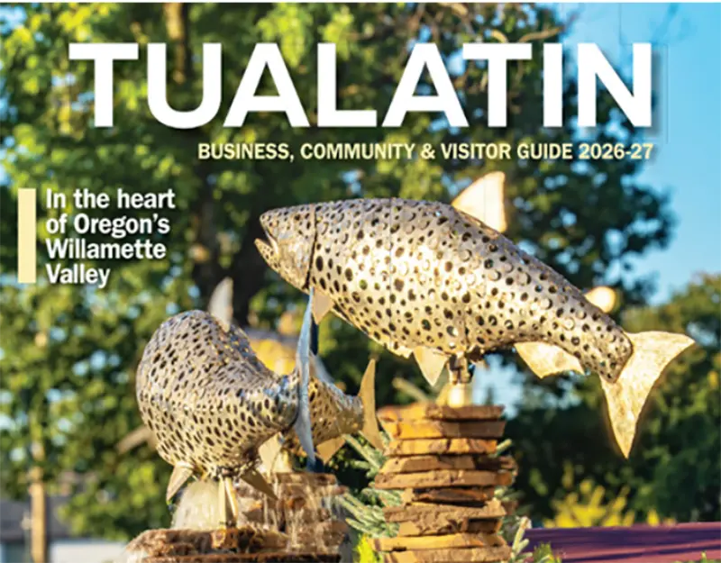 Tualatin business, community, and visitor guide cover featuring metal fish sculptures in the Willamette Valley.